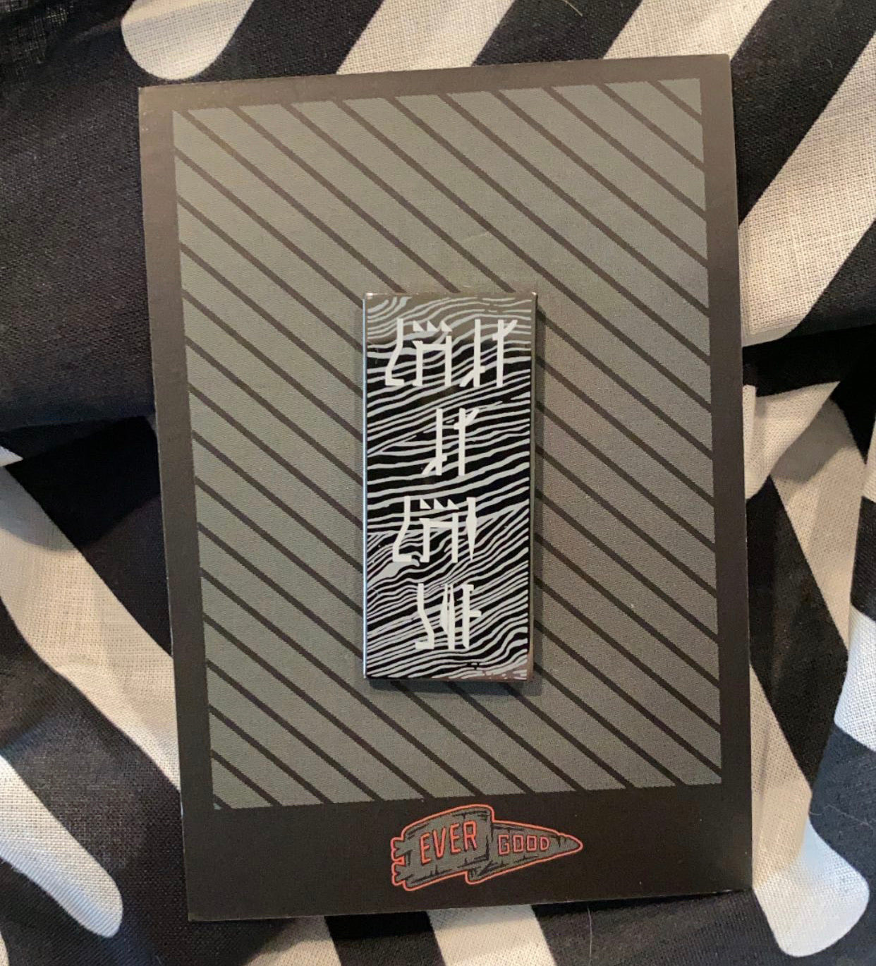 Kind of like steel enamel pin